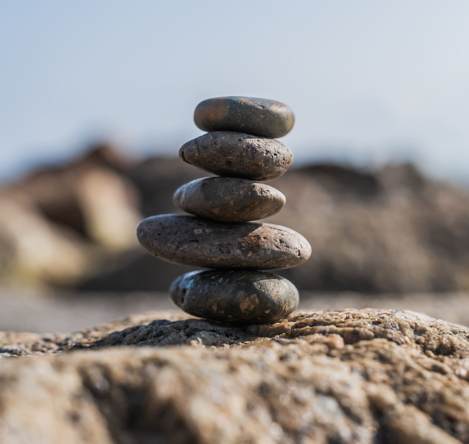 rock stone stack on sea beach sign zen meditation scaled